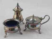 Appraisal: A silver three piece cruet set the cauldron salt and