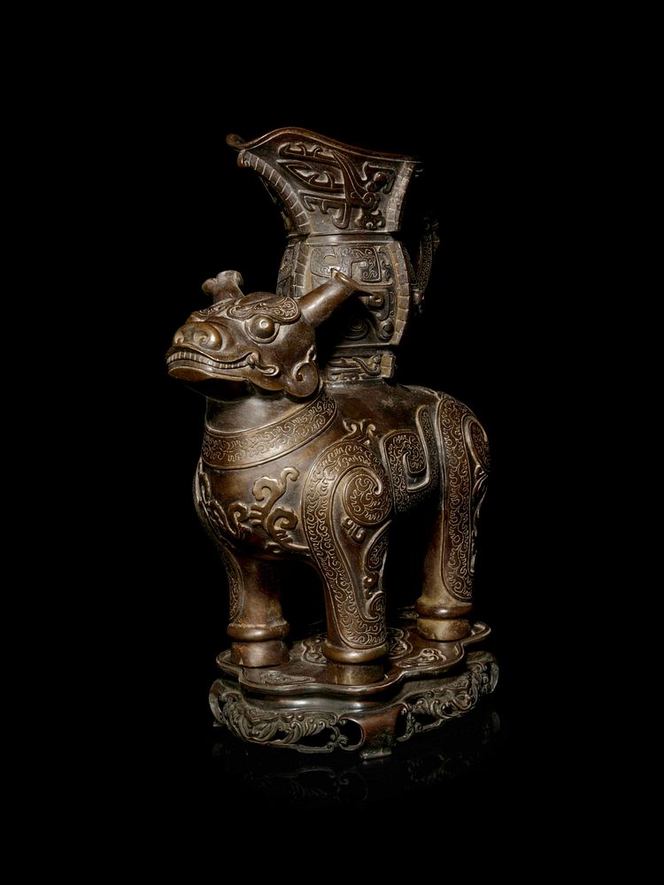 Appraisal: A Bronze Animal-Form Vessel Height overall in cm A Bronze