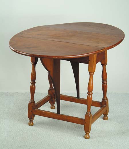 Appraisal: SPLAY LEG BUTTERFLY LEAF TAVERN TABLE Oval top turned splay