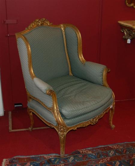 Appraisal: LOUIS XV STYLE CARVED GILT WOOD AND UPHOLSTERED ARMCHAIR TH