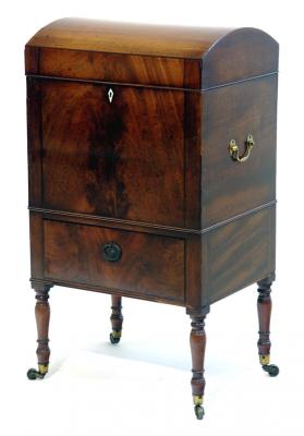 Appraisal: A GEORGE III MAHOGANY CELLARETTE of oblong form with ebony