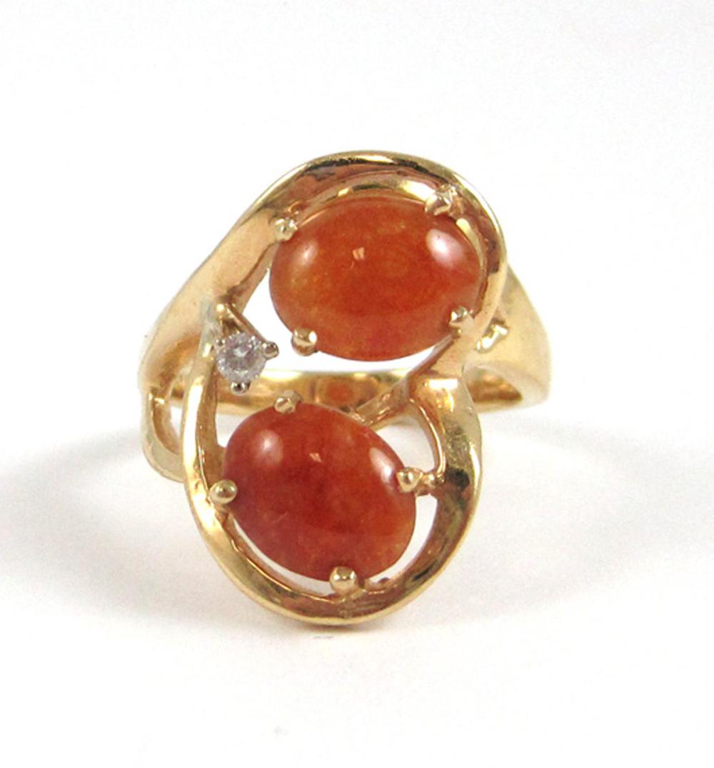 Appraisal: RED JADE DIAMOND AND FOURTEEN KARAT GOLD RING The k