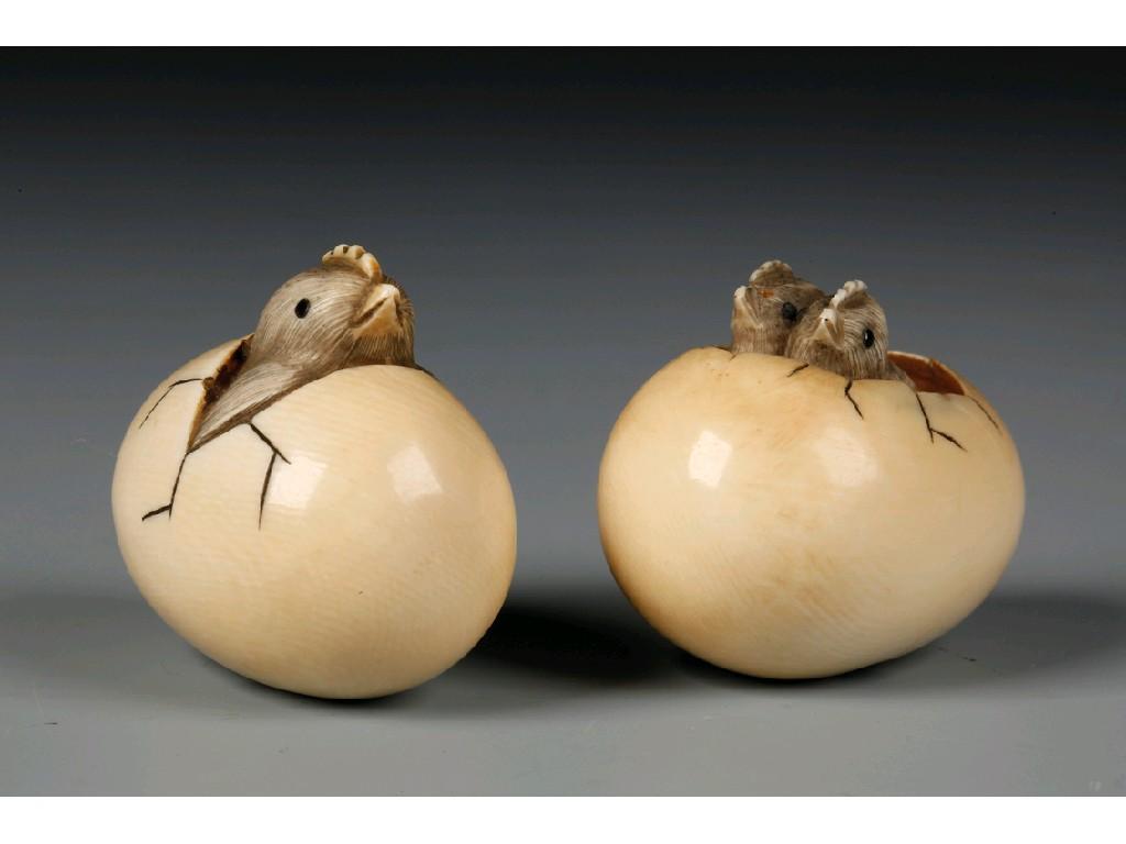 Appraisal: TWO JAPANESE IVORY NETSUKE CARVINGS OF HATCHING CHICKENS Meiji signed