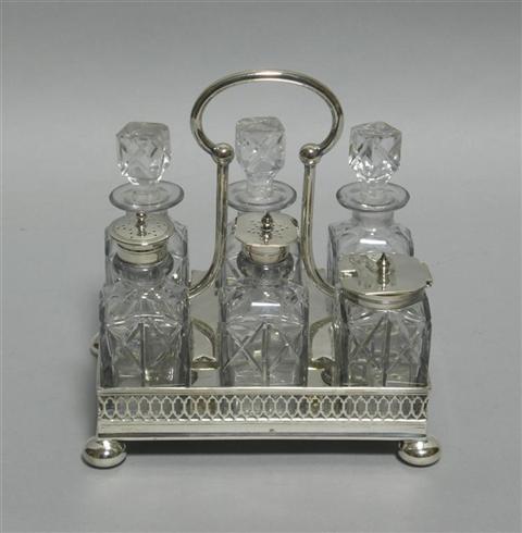 Appraisal: ENGLISH SILVER PLATE AND GLASS CRUET SET Makers mark HH