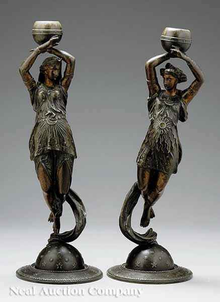 Appraisal: A Pair of French Patinated Metal Figural Candlesticks c depicting