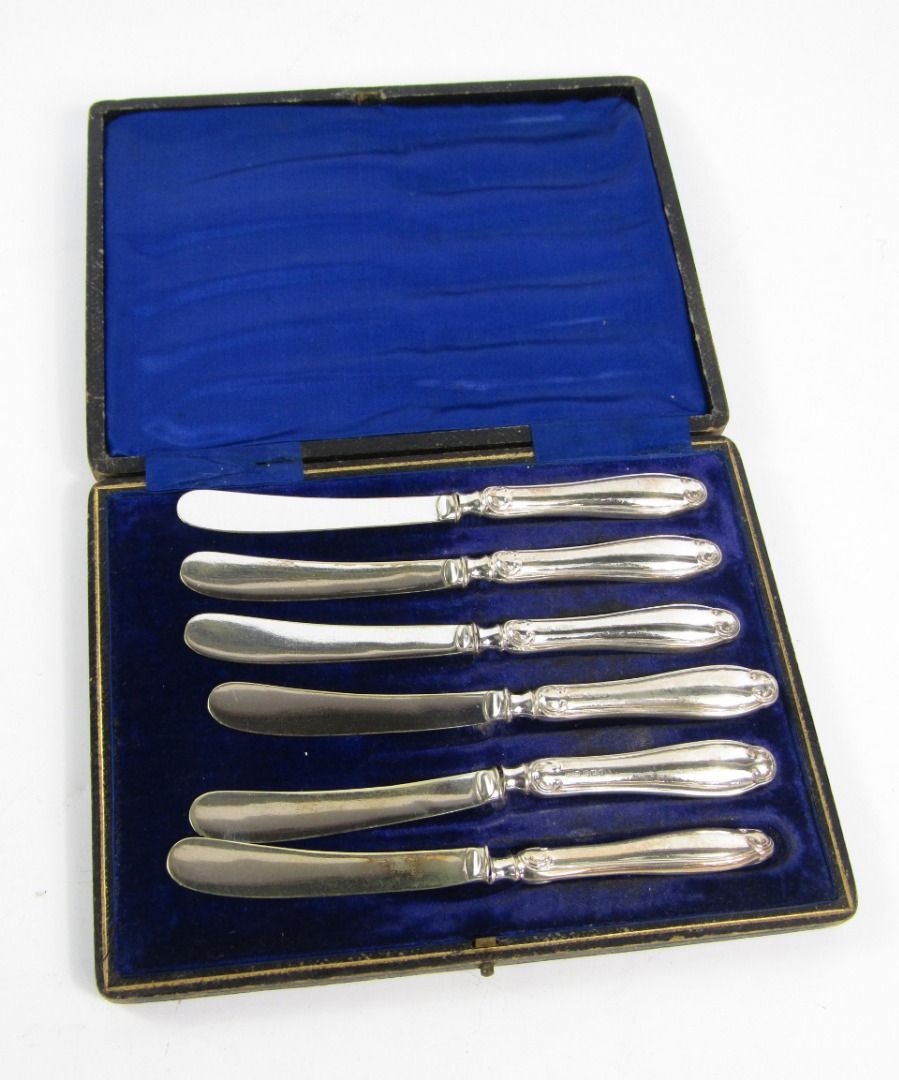 Appraisal: A set of six George V silver cake knives Sheffield