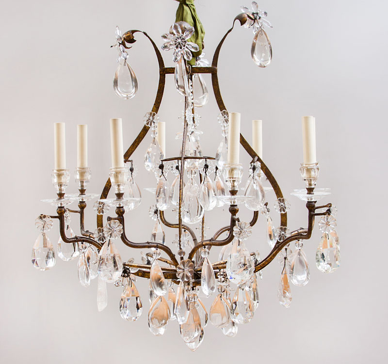 Appraisal: LOUIS XV STYLE GILT-METAL-MOUNTED FACETED-GLASS AND ROCK-CRYSTAL EIGHT-LIGHT CHANDELIER Of