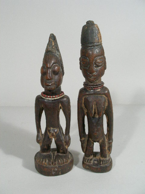 Appraisal: West African Pair of Yoruba Carved Wooden Figures charming statuettes