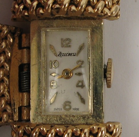 Appraisal: LADY'S FOURTEEN KARAT GOLD INTEGRAL BRACELET WRISTWATCH the wide gold