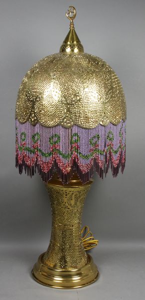 Appraisal: Indian brass open work table lamp with beaded fringed shade