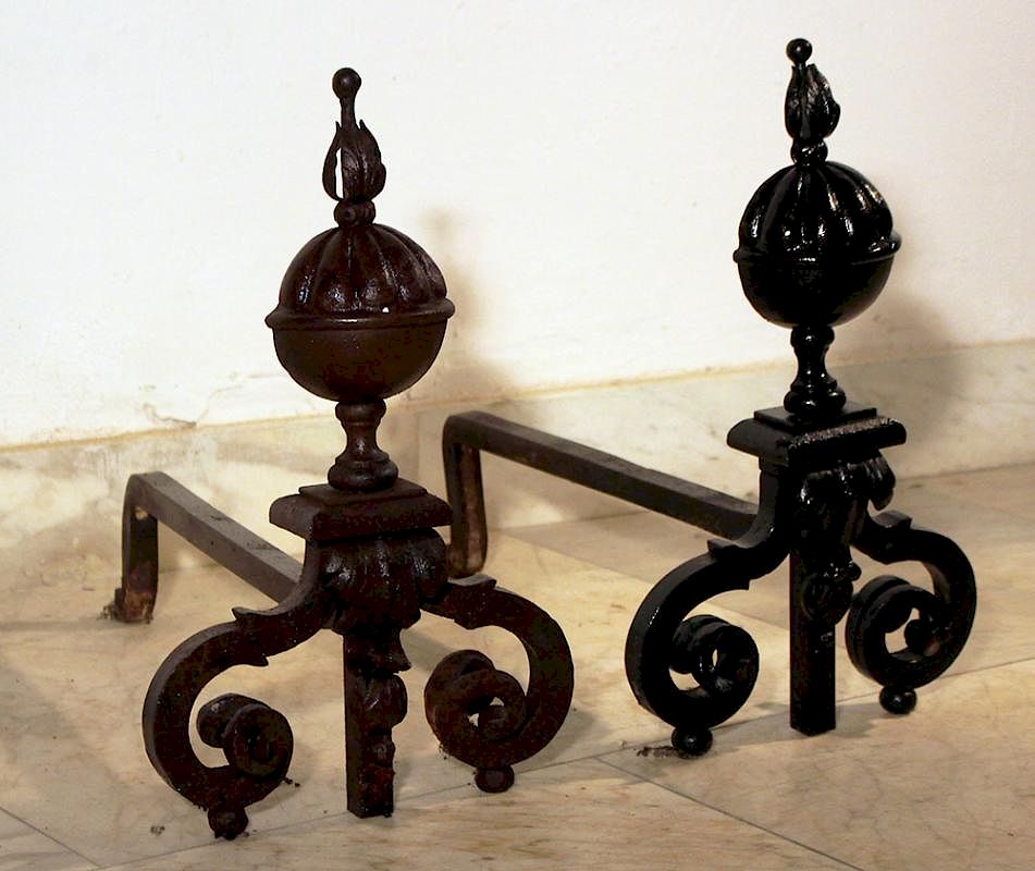 Appraisal: Pair of baroque andirons Pair of baroque andirons iron forge