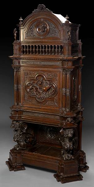 Appraisal: An Italian Renaissance style carved walnut cabinet second half th