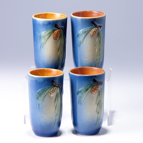 Appraisal: Four ROSEVILLE blue Pine Cone tumblers - Shallow scratches and