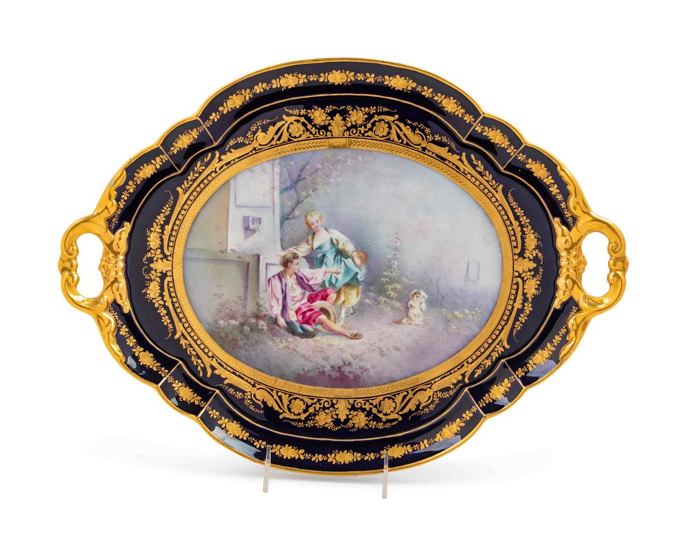 Appraisal: A Sevres Style Painted and Parcel Gilt Porcelain Two-Handled Tray