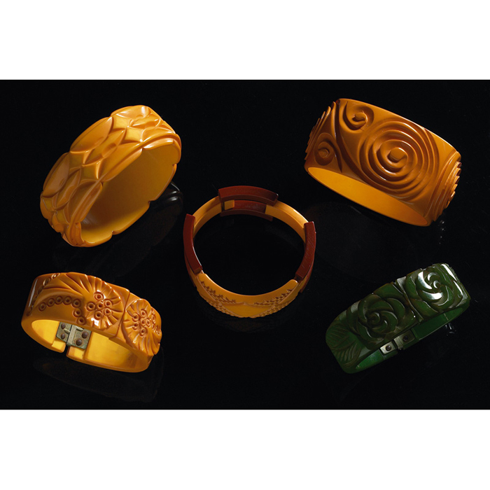 Appraisal: Bakelite bracelet deeply carved butterscotch hinged with stylized leaf design