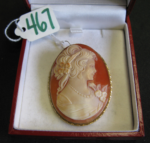 Appraisal: VICTORIAN CAMEO PENDANT BROOCH an oval portrait of a young