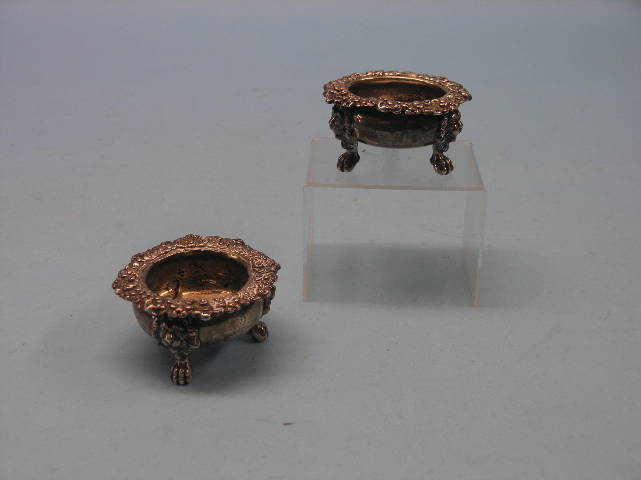 Appraisal: A pair of Victorian silver salts with elaborate cast floral