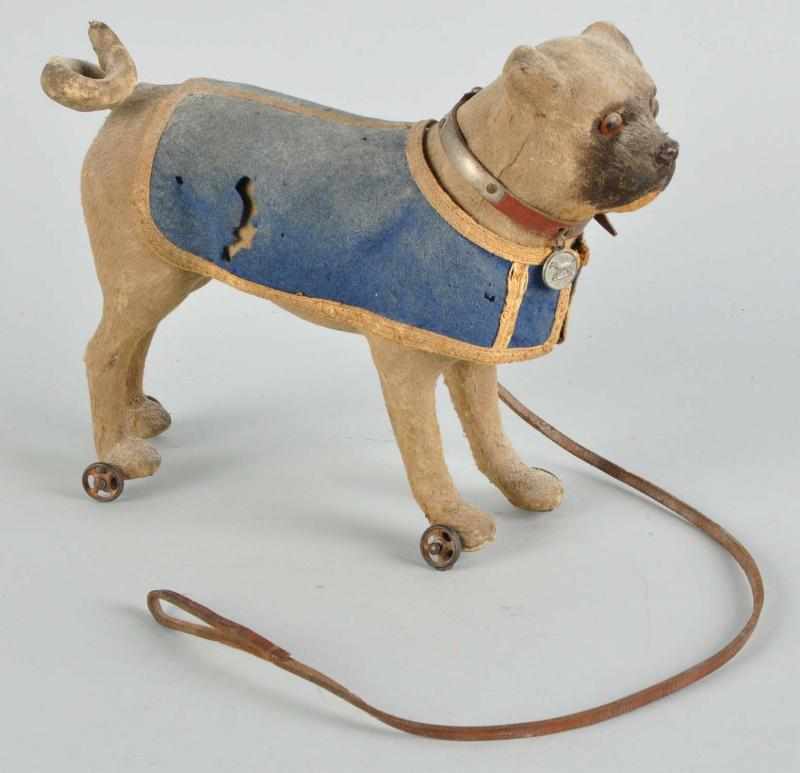 Appraisal: Bulldog on Wheels Platform Toy Description German Original leather collar