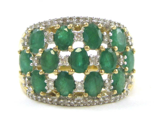 Appraisal: EMERALD DIAMOND AND FOURTEEN KARAT GOLD RING set with oval-cut