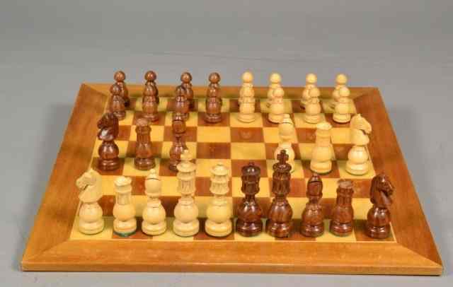 Appraisal: HAND CARVED WOODEN CHESS SETHand carved wooden traditional chess set