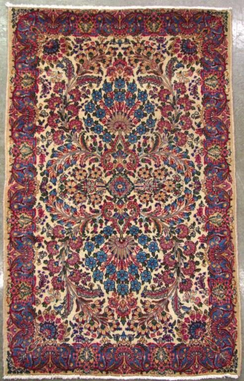 Appraisal: Handmade Oriental Area Rug Kirman design tan field with red