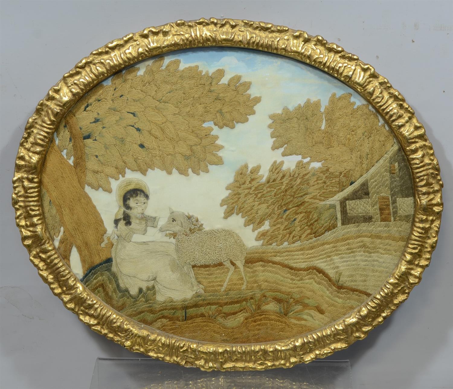 Appraisal: Oval English Embroidery century Girl with Lamb in antique gilt