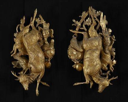 Appraisal: PAIR OF BLACK FOREST CARVED GILTWOOD HUNT TROPHIES Each incorporating