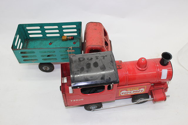 Appraisal: A TRI-ANG GREEN AND RED PAINTED TRUCK cm long together