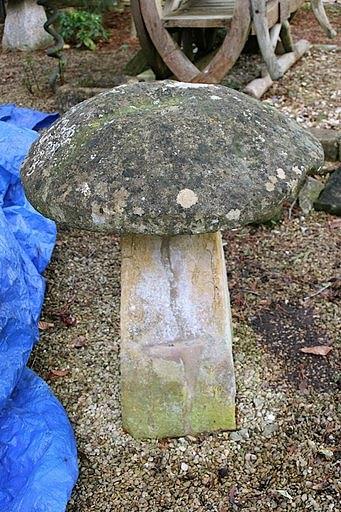 Appraisal: A staddle stone with circular top and a square pedestal