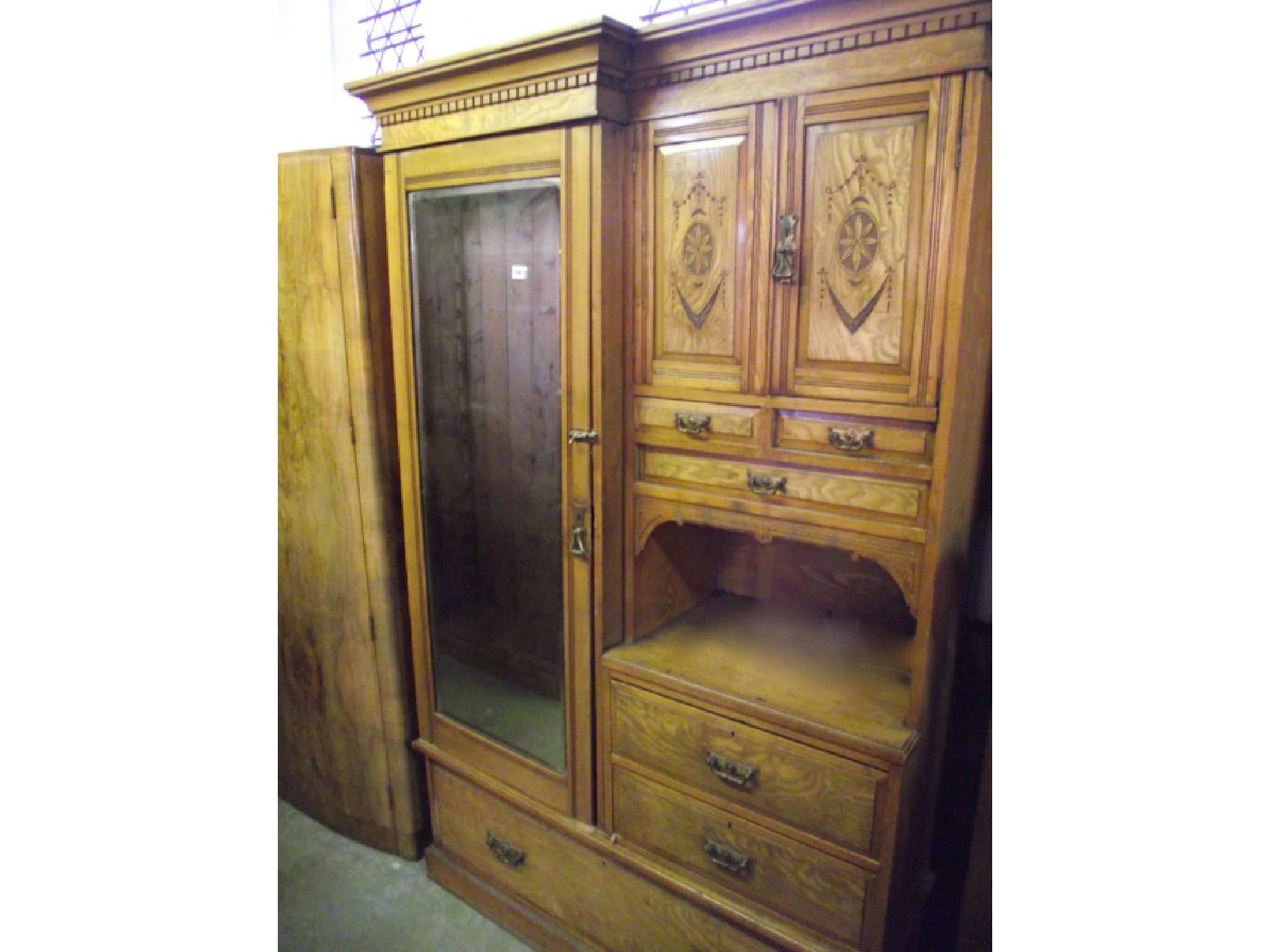 Appraisal: A late th century ash and figured ashwood compactum wardrobe