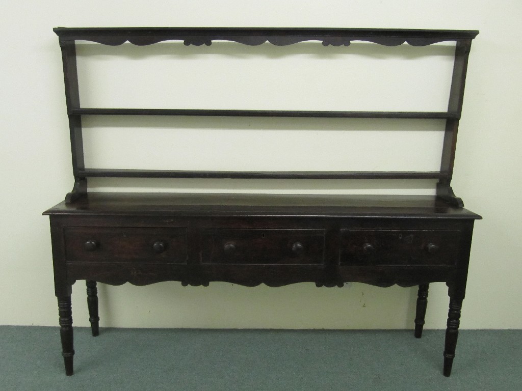 Appraisal: A late th century stained oak dresser the two tier