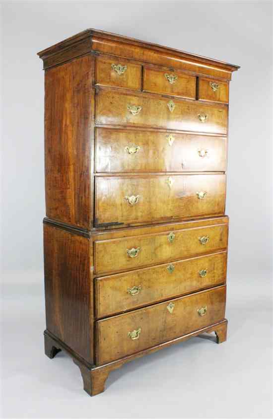 Appraisal: An early th century walnut and herringbone chest on chest