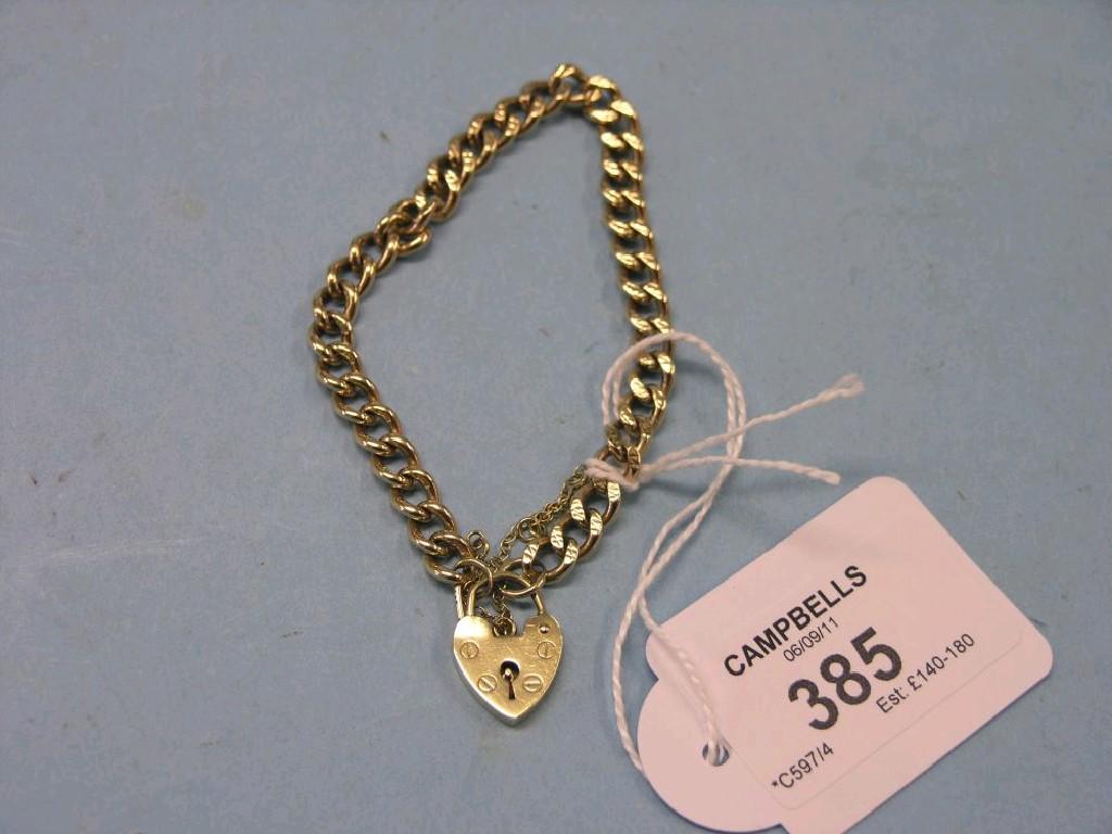 Appraisal: A ct gold chain bracelet with heart-shape padlock pendant grams