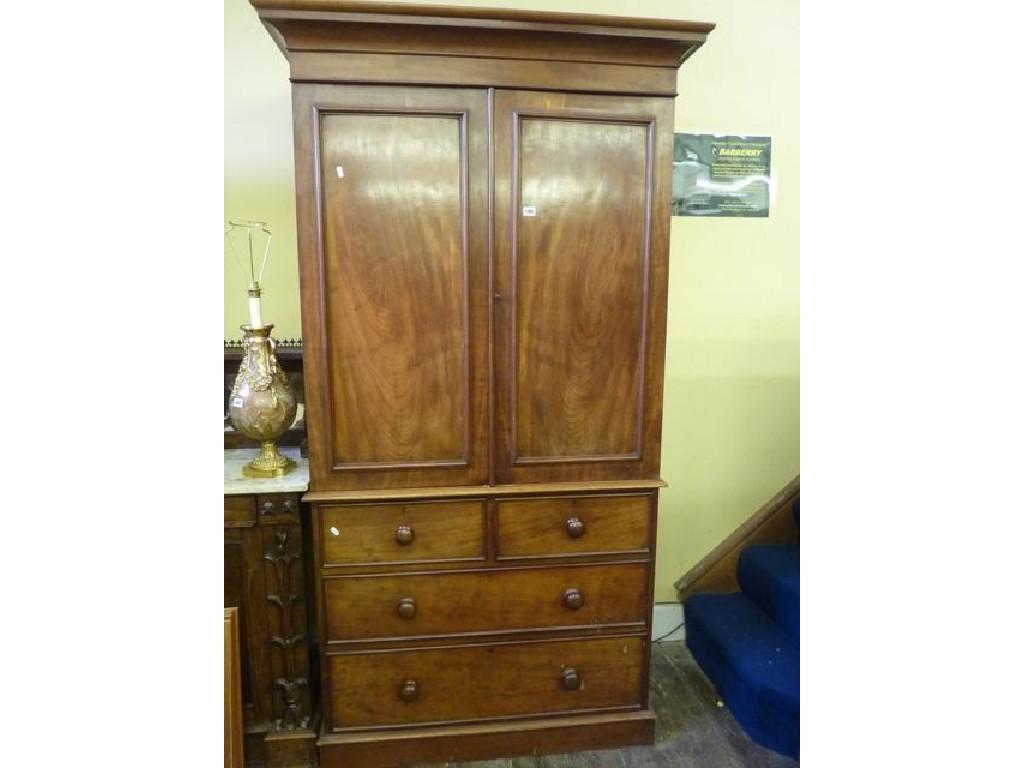 Appraisal: A th century mahogany linen press of neat proportions with