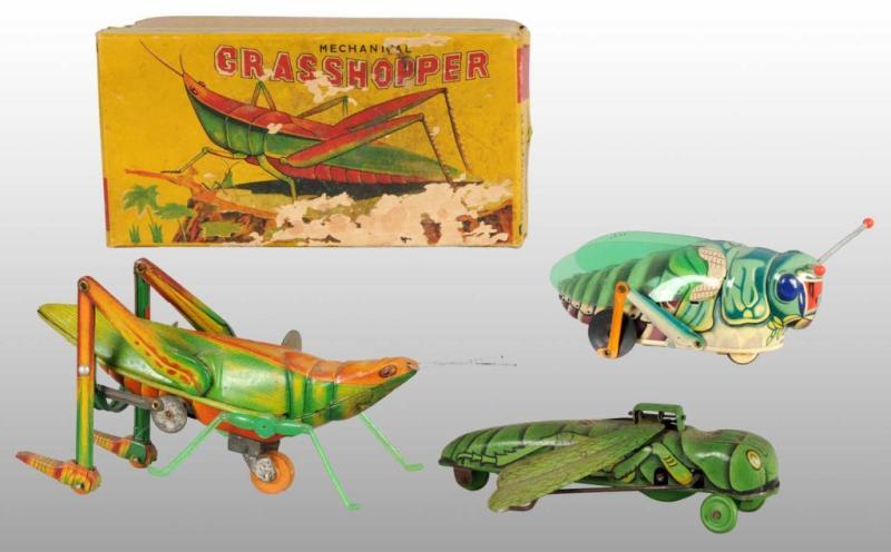 Appraisal: Lot of Grasshopper Wind-Up Toys Description Japanese Working One is