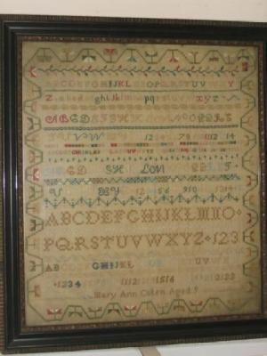 Appraisal: A NEEDLEWORK SAMPLER early th century worked by Mary Ann