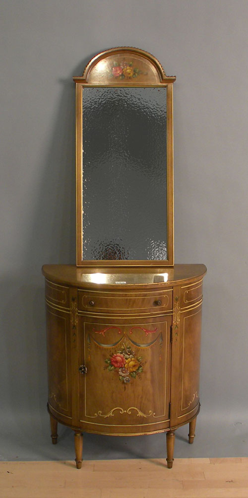 Appraisal: Floral decorated commode with matching mirror h w and x