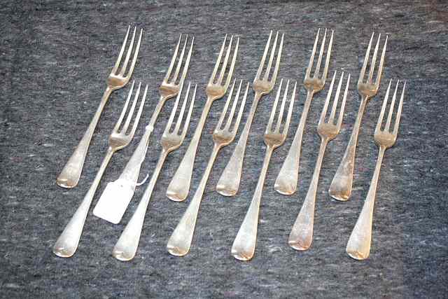 Appraisal: A SET OF TWELVE HANOVARIAN PATTERN THREE PRONG TABLE FORKS