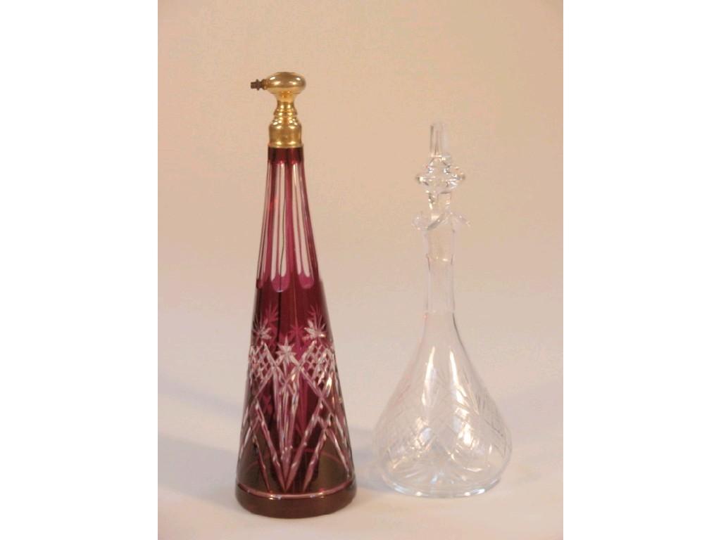 Appraisal: An amethyst slice cut bottle with atomiser cm and a