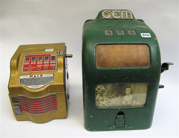 Appraisal: TWO COLLECTABLE COIN-OPERATED GUN VENDING TRADE STIMULATORS -cent green GEM