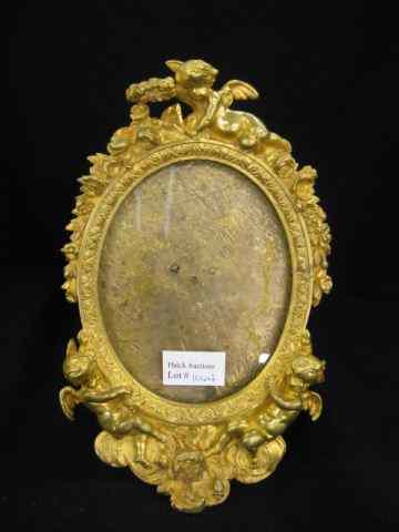 Appraisal: th Century Brass Frame cherub floral decor oval image area