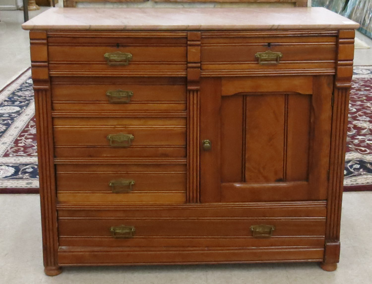 Appraisal: VICTORIAN MARBLE-TOP WALNUT BUFFET Eastlake design American c having a