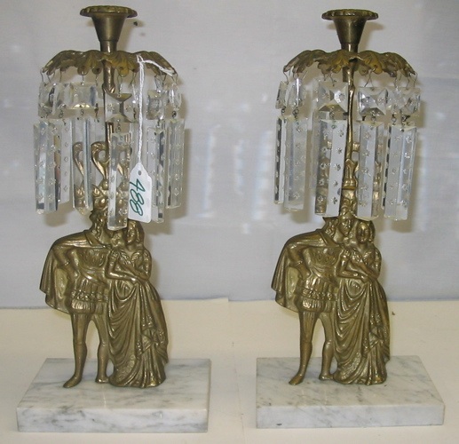 Appraisal: PAIR OF GILT METAL FIGURAL CANDLESTICK GARNITURES each a couple