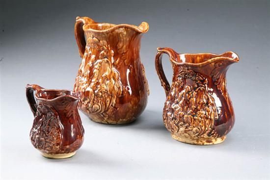 Appraisal: SET OF SIX ROCKINGHAM HUNT SCENE PITCHERS American mid th