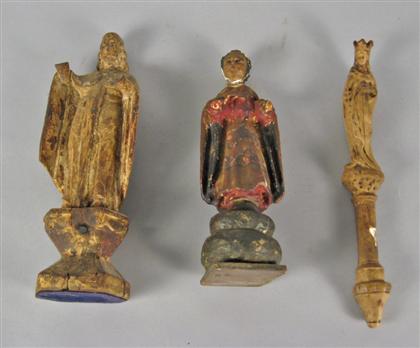 Appraisal: Three carved and painted wooden figures of saints Two of