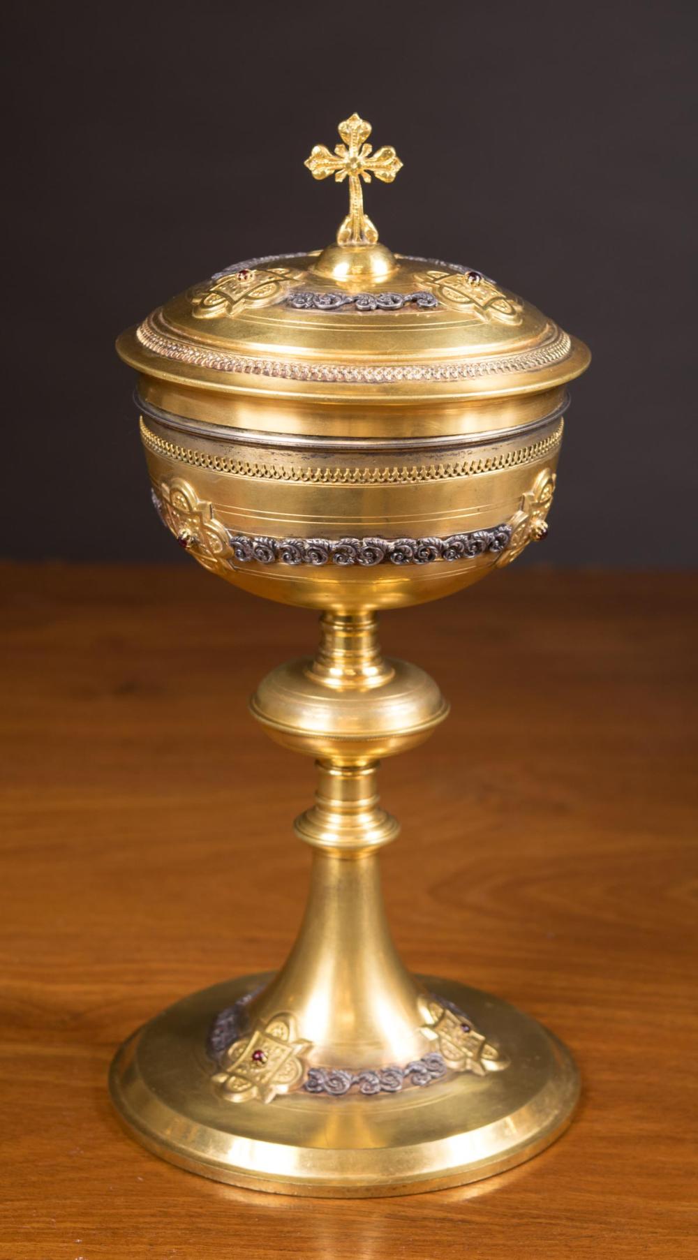 Appraisal: STERLING SILVER COVERED CIBORIUM gold plated and inset with garnet