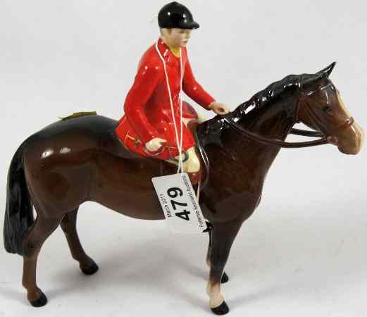 Appraisal: Beswick Model of a Huntsman on Brown Horse