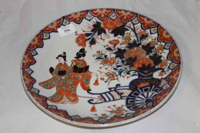 Appraisal: A JAPANESE IMARI SHALLOW CHARGER decorated with two Geisha and