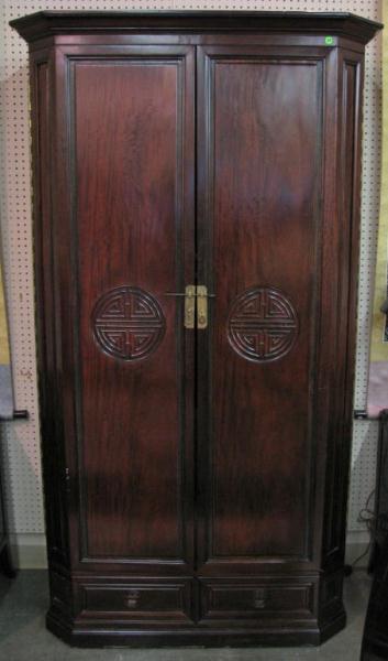 Appraisal: Mahogany double-door Oriental entertainment armoire with applied carvings circa s