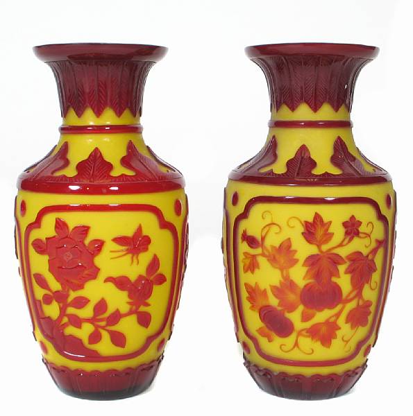 Appraisal: A pair of red and yellow Peking glass vases height